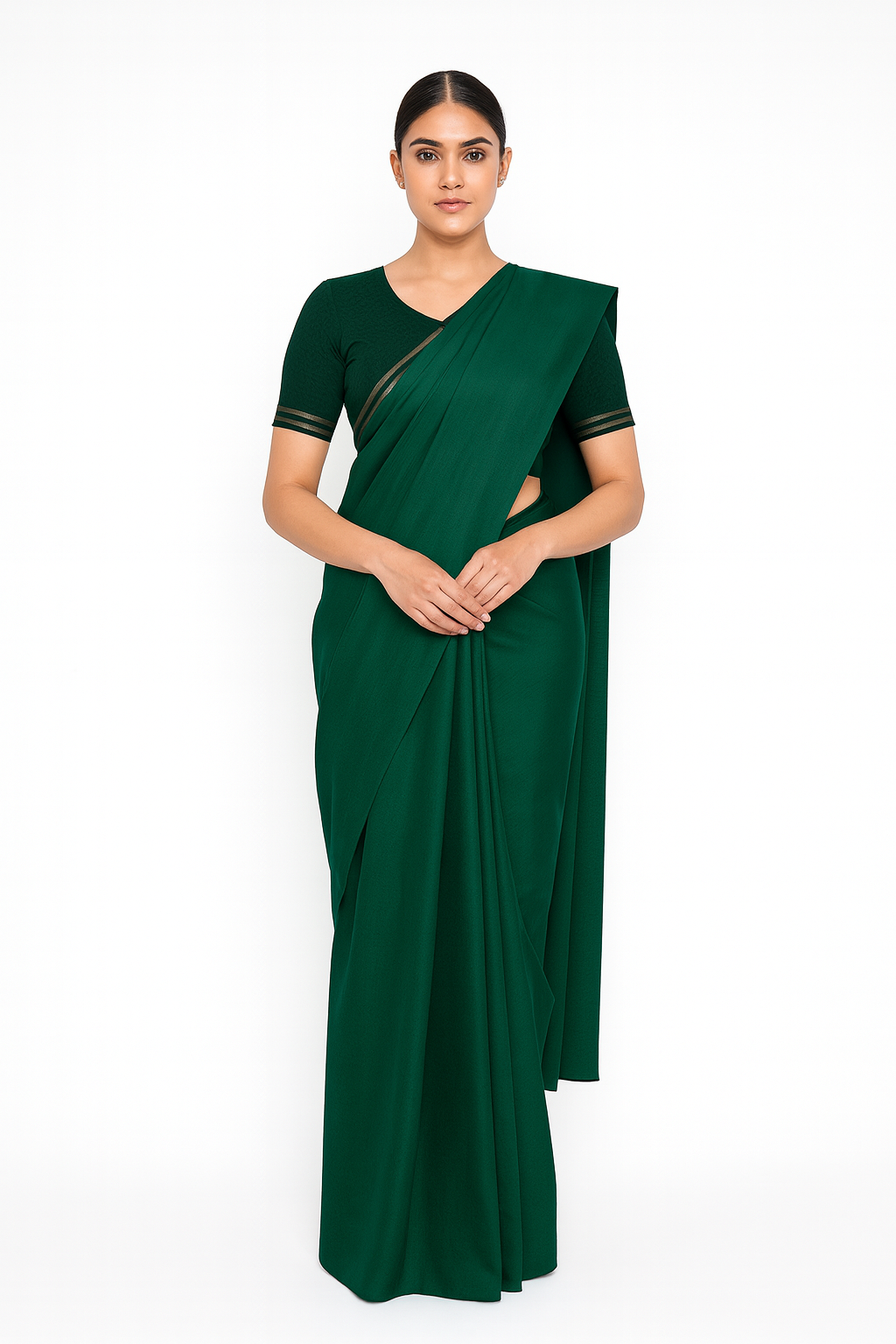 Woman wearing a green saree with a white background